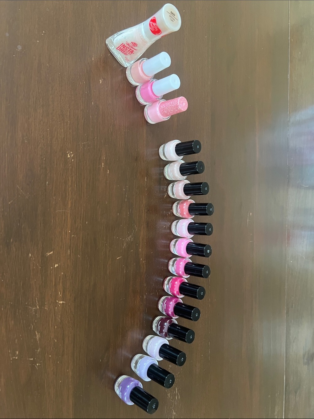 Assorted Pink, Purple, and nude Nail Polish
